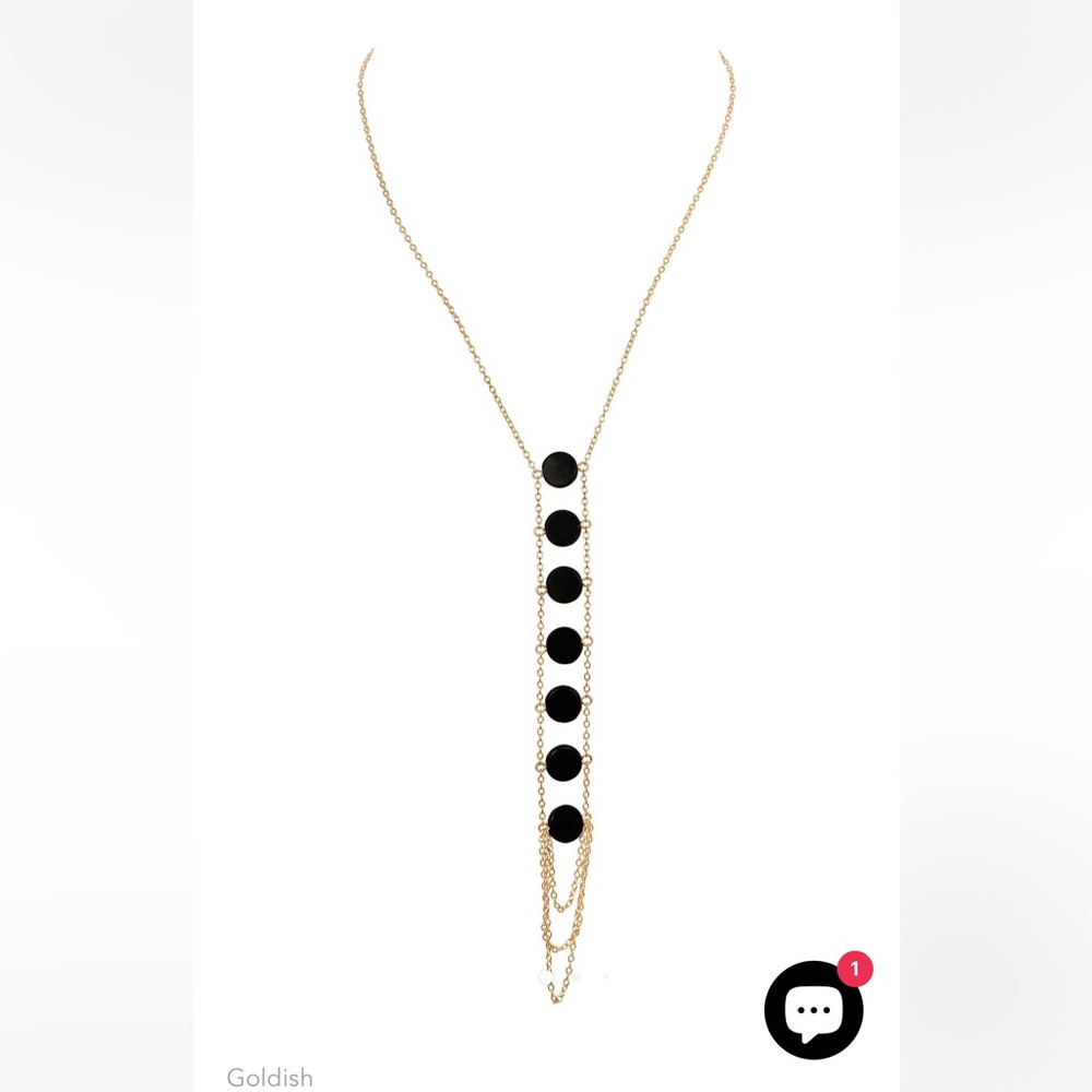 “7 Chakra” necklace from NYC boutique Goldish. Elevates anything!